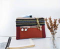 Bolsa de mão com bordados, tela bordeaux e laranja tijolo | Joana Candeias