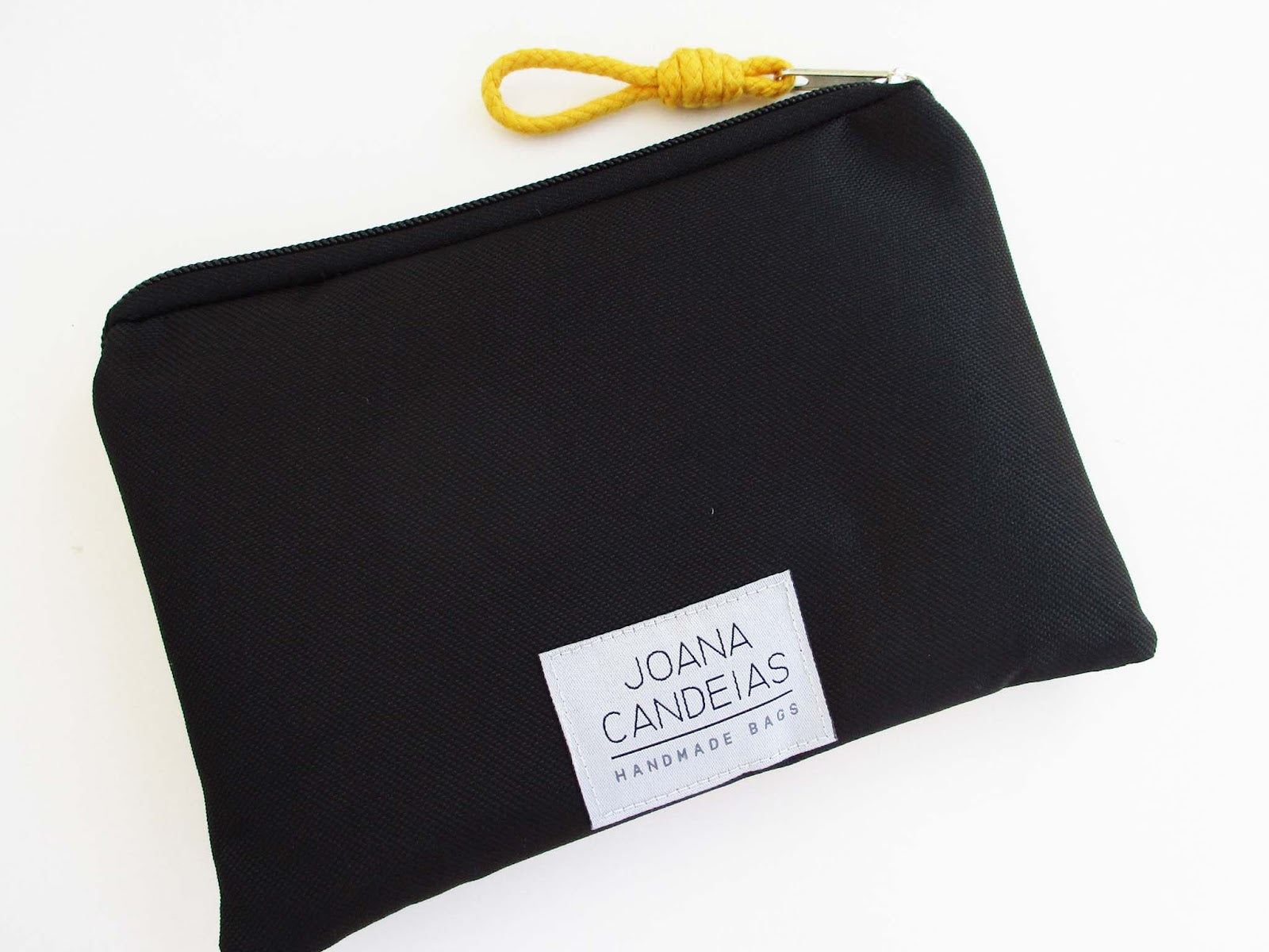 Bolsa de mão padrão geométrico, tela preta e amarelo | Joana Candeias