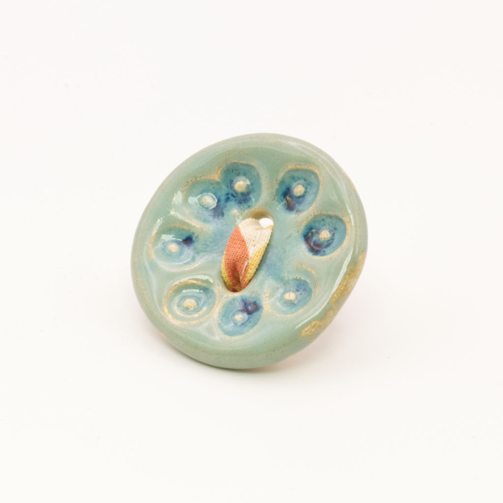 Pregadeira Botão azul | Pássaro de Seda